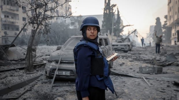 Photojournalist who risked her life in Gaza asks herself: Can a photo make a difference?