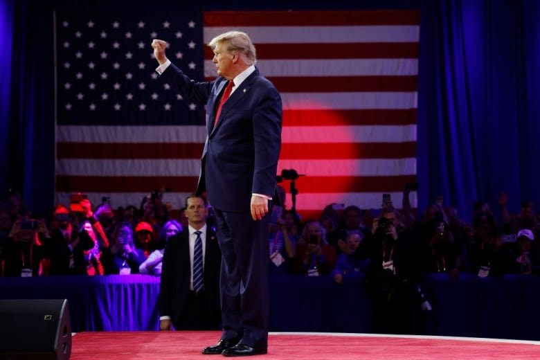 Republican presidential candidate and former U.S. President Donald Trump walks offstage after his remarks at the Conservative Political Action Conference (CPAC) at the Gaylord National Resort Hotel And Convention Center on February 24,