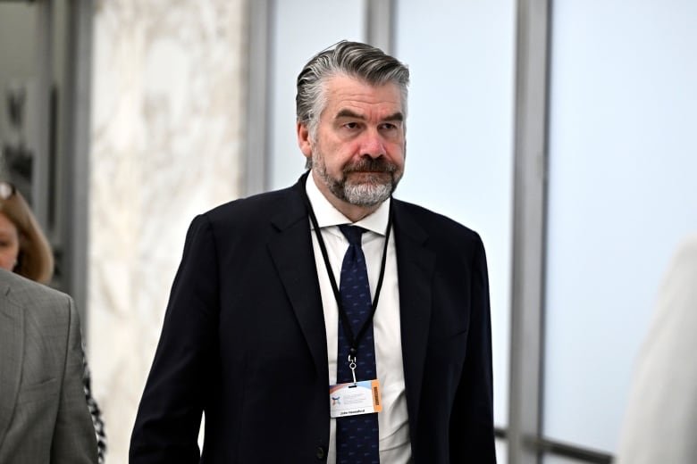 Clerk of the Privy Council John Hannaford John Hannaford returns to the hearing room after a break at the Foreign Interference Commission in Ottawa, on Wednesday, Oct. 9, 2024. THE CANADIAN PRESS/Justin Tang